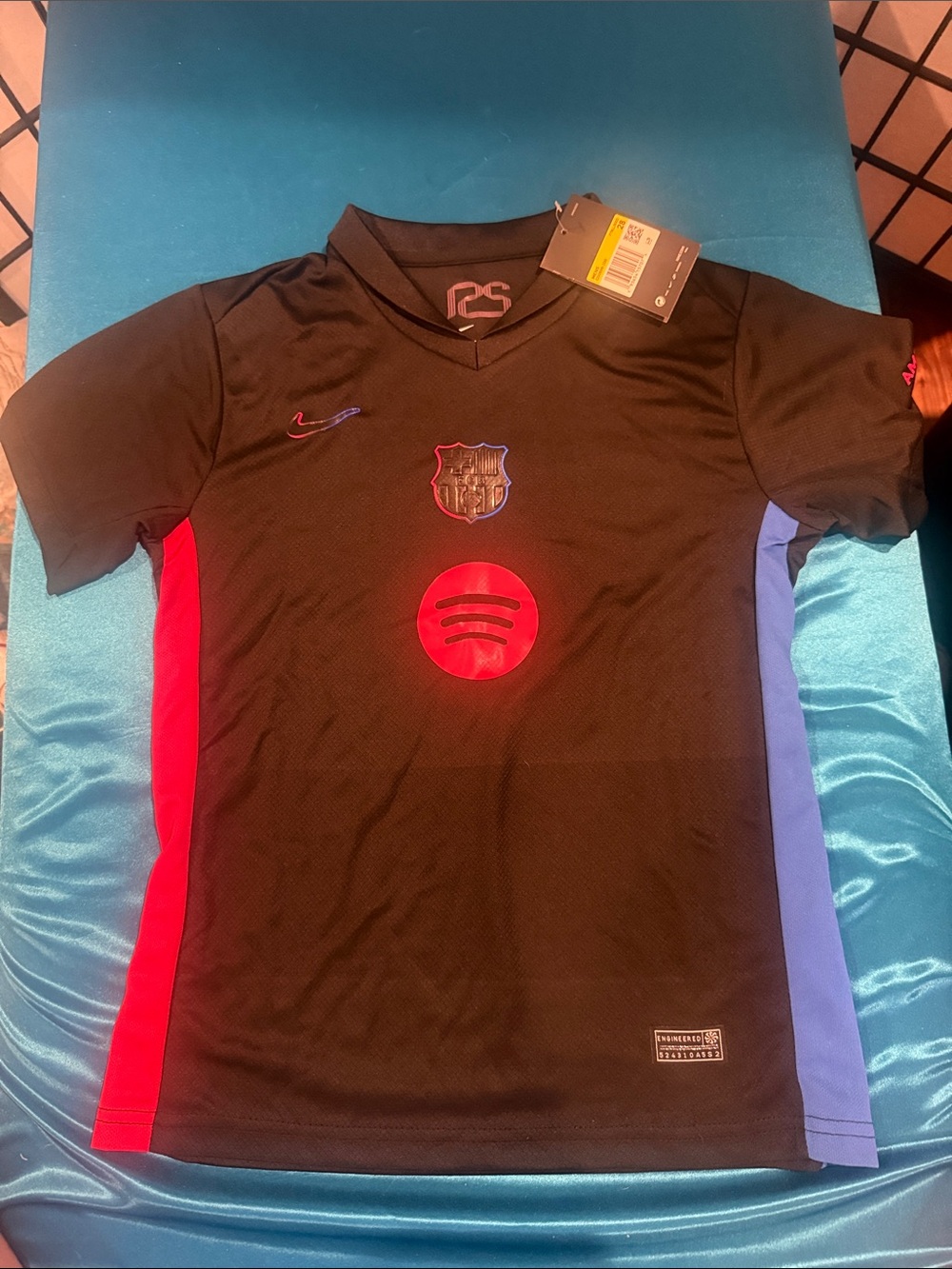 Nike Kids Black Soccer Jersey with Red & Blue Side Panels